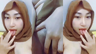 Mature Hijabi Beauty Flaunts Her Tight Wet Pussy With Intense Fingering